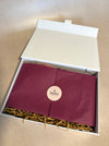 Maroon product with 'mora' logo in a white box on a beige background. Gift Set Mora Hanging Decorations 